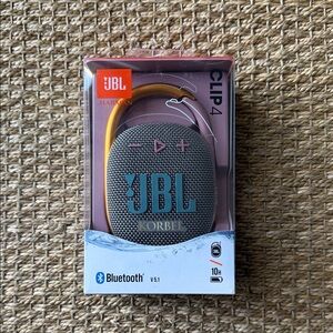 JBL Clip 4 Bluetooth Speaker in Black and Gold